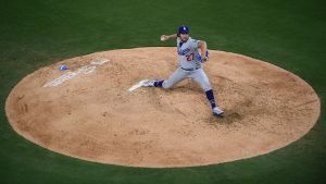 Jun 23, 2021; San Diego, California, USA; Los Angeles Dodgers starting pitcher Trevor Bauer (27) throws a pitch against the San Diego Padres during the fourth inning at Petco Park.