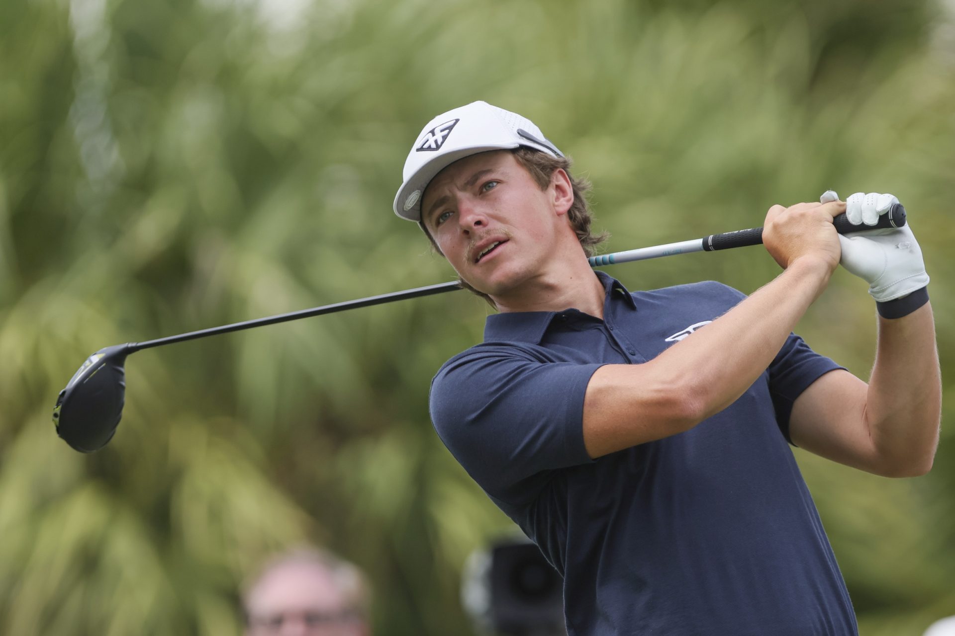 Oct 20, 2023; Doral, Florida, USA; James Piot plays his shot from the eighth tee during the first round of the LIV Golf Miami golf tournament at Trump National Doral.