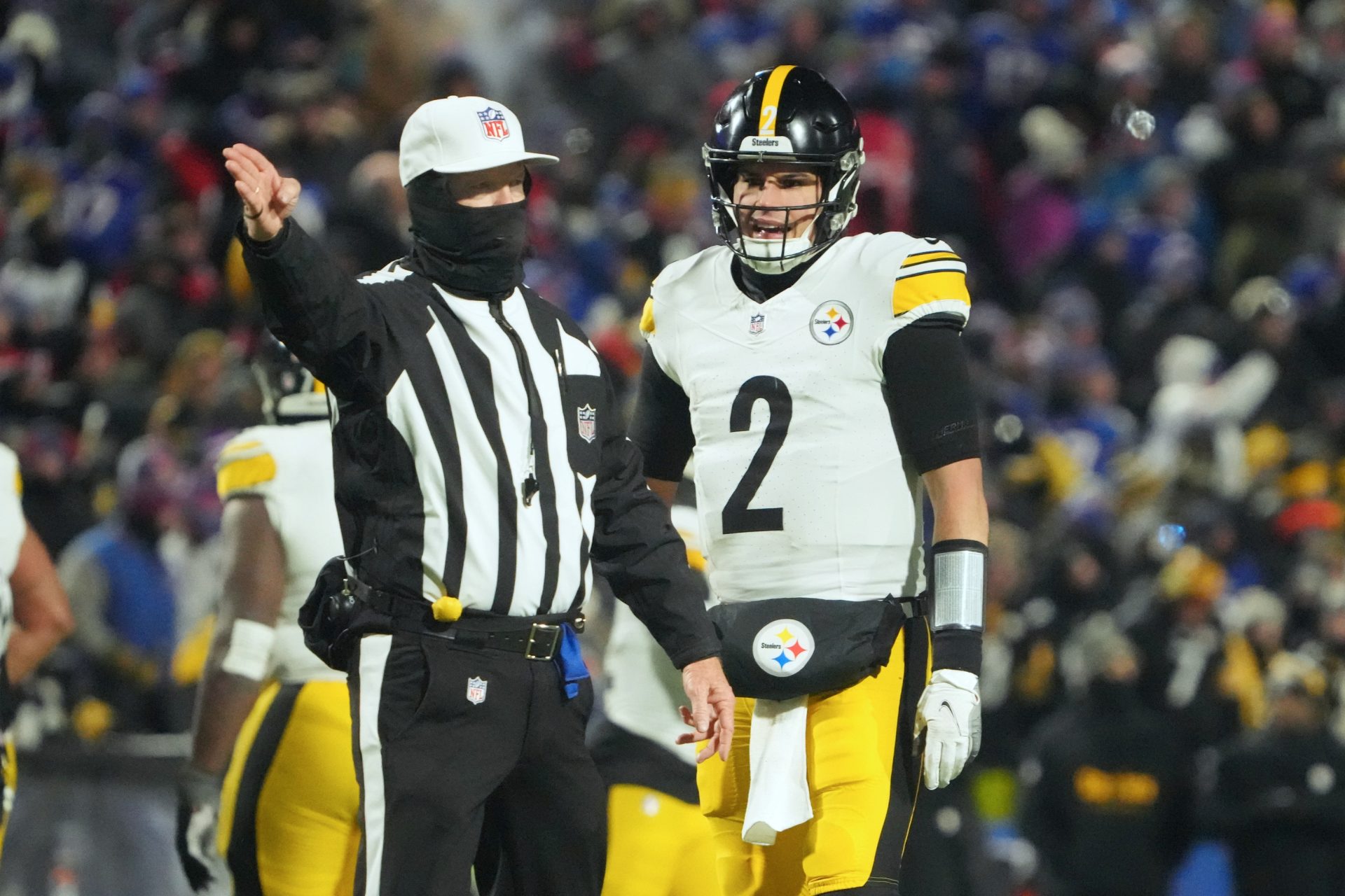Jan 15, 2024; Orchard Park, New York, USA; Pittsburgh Steelers quarterback Mason Rudolph (2) talks with an official in the second half against the Buffalo Bills in a 2024 AFC wild card game at Highmark Stadium.