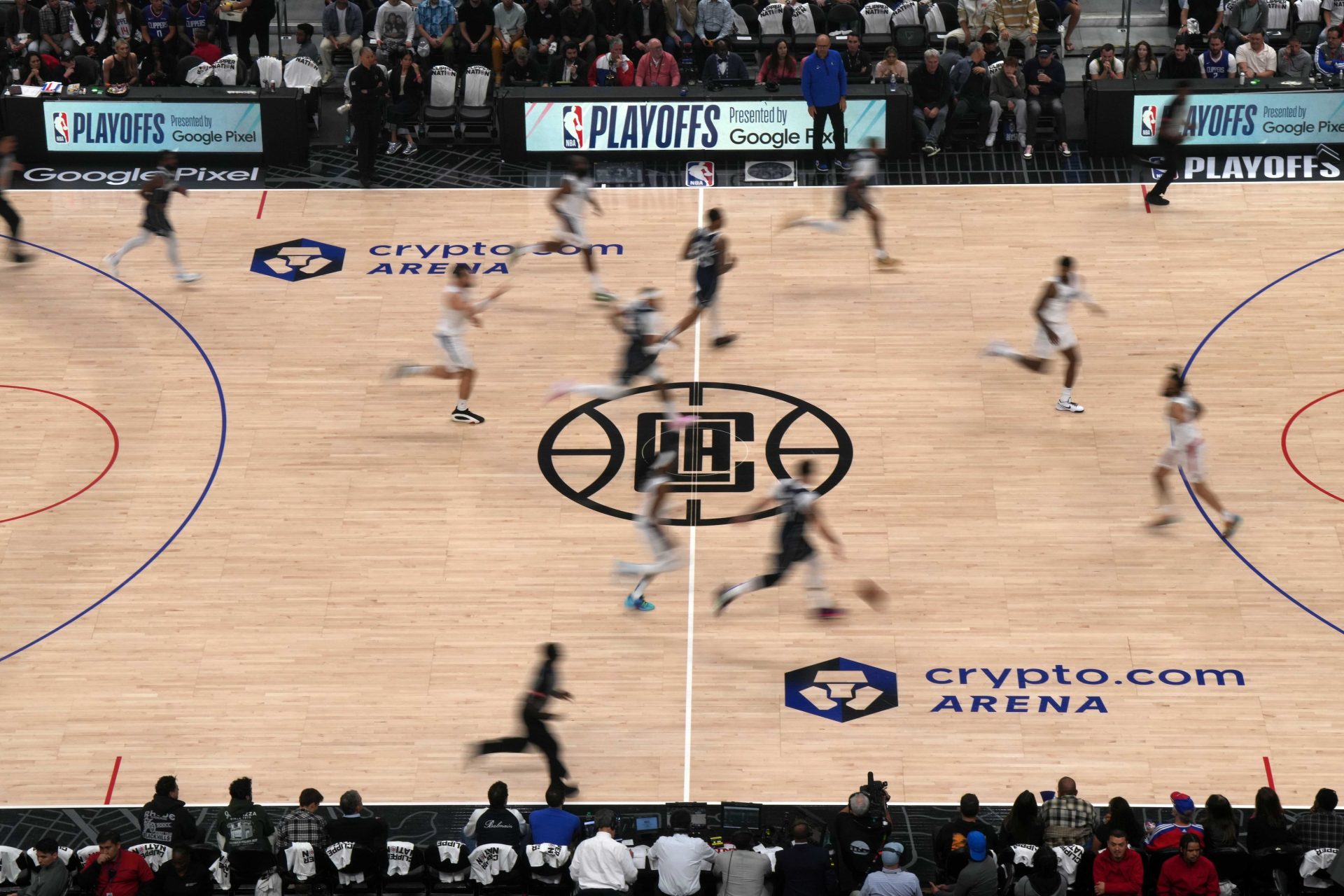 May 1, 2024; Los Angeles, California, USA; A general overall view as Dallas Mavericks and LA Clippers players run across the Clippers logo at midcourt in the first half during game five of the first round for the 2024 NBA playoffs at Crypto.com Arena.