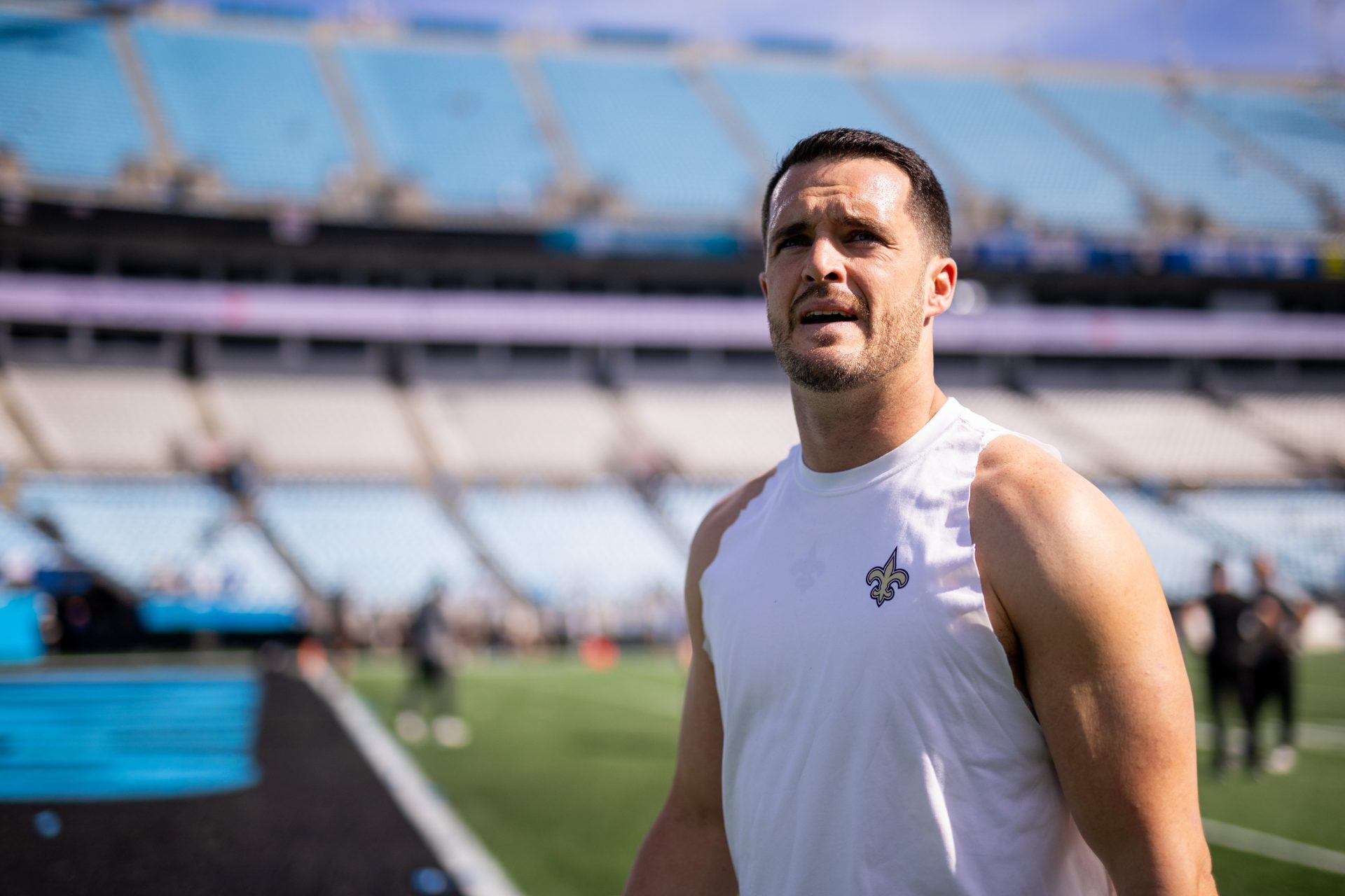 Nov 3, 2024; Charlotte, North Carolina, USA; New Orleans Saints quarterback Derek Carr (4) walks off before a game against the Carolina Panthers at Bank of America Stadium.