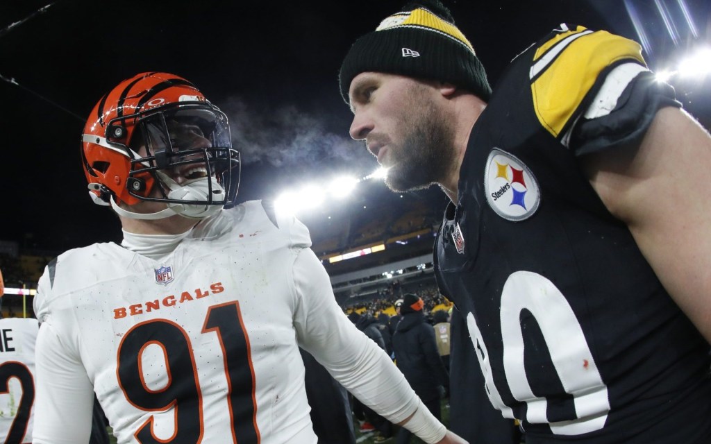 Jan 4, 2025; Pittsburgh, Pennsylvania, USA; Cincinnati Bengals defensive end Trey Hendrickson (91) and Pittsburgh Steelers linebacker T.J. Watt (90) talk after the game at Acrisure Stadium.