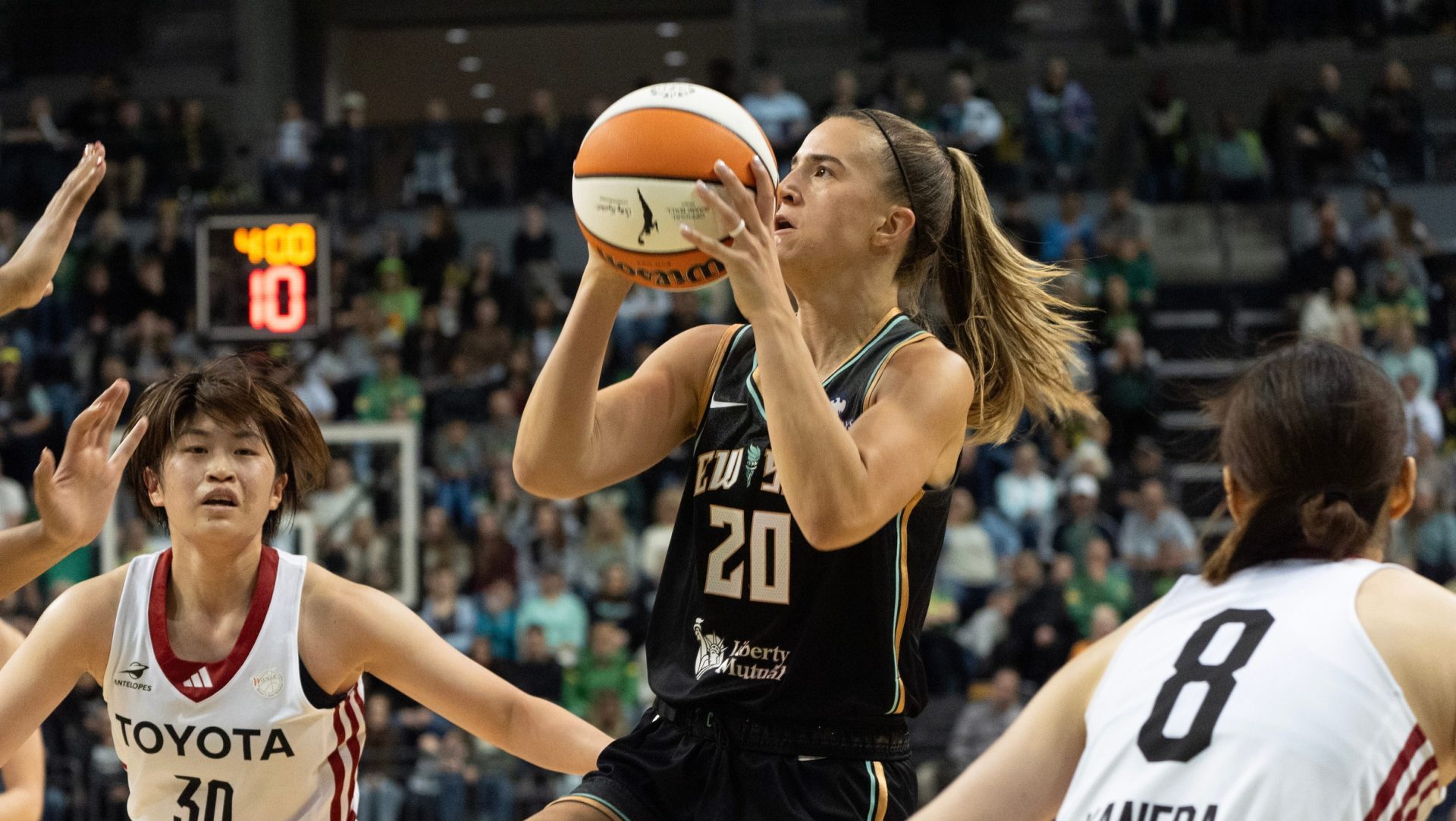 Sabrina Ionescu with the New York Liberty shots over defenders from the Toyota Antelopes during the first half at Matthew Knight Arena May 12, 2025 in Eugene.