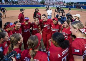 Jun 2, 2025; Oklahoma City, OK, USA; Texas Tech Red Raiders players celebrate after defeating the Oklahoma Sooners 3-2 and advance to the finals against Texas in the NCAA Softball Women's College World Series semifinal game at Devon Park.