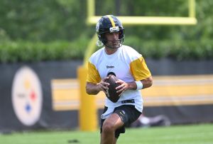 Jun 10, 2025; Pittsburgh, PA, USA; Pittsburgh Steelers quarterback Aaron Rodgers (8) drops back to pass during minicamp at their South Side facility.