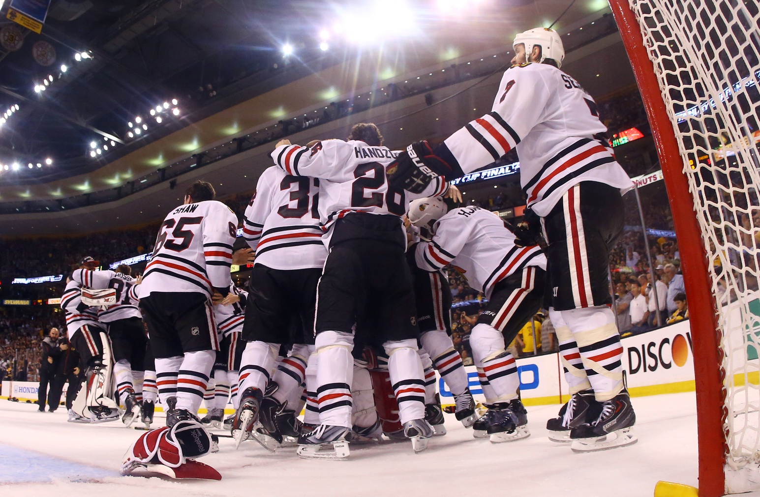 Jun 24, 2013; Boston, MA, USA; Chicago Blackhawks players celebrate on th eice after game six of the 2013 Stanley Cup Final against the Boston Bruins at TD Garden