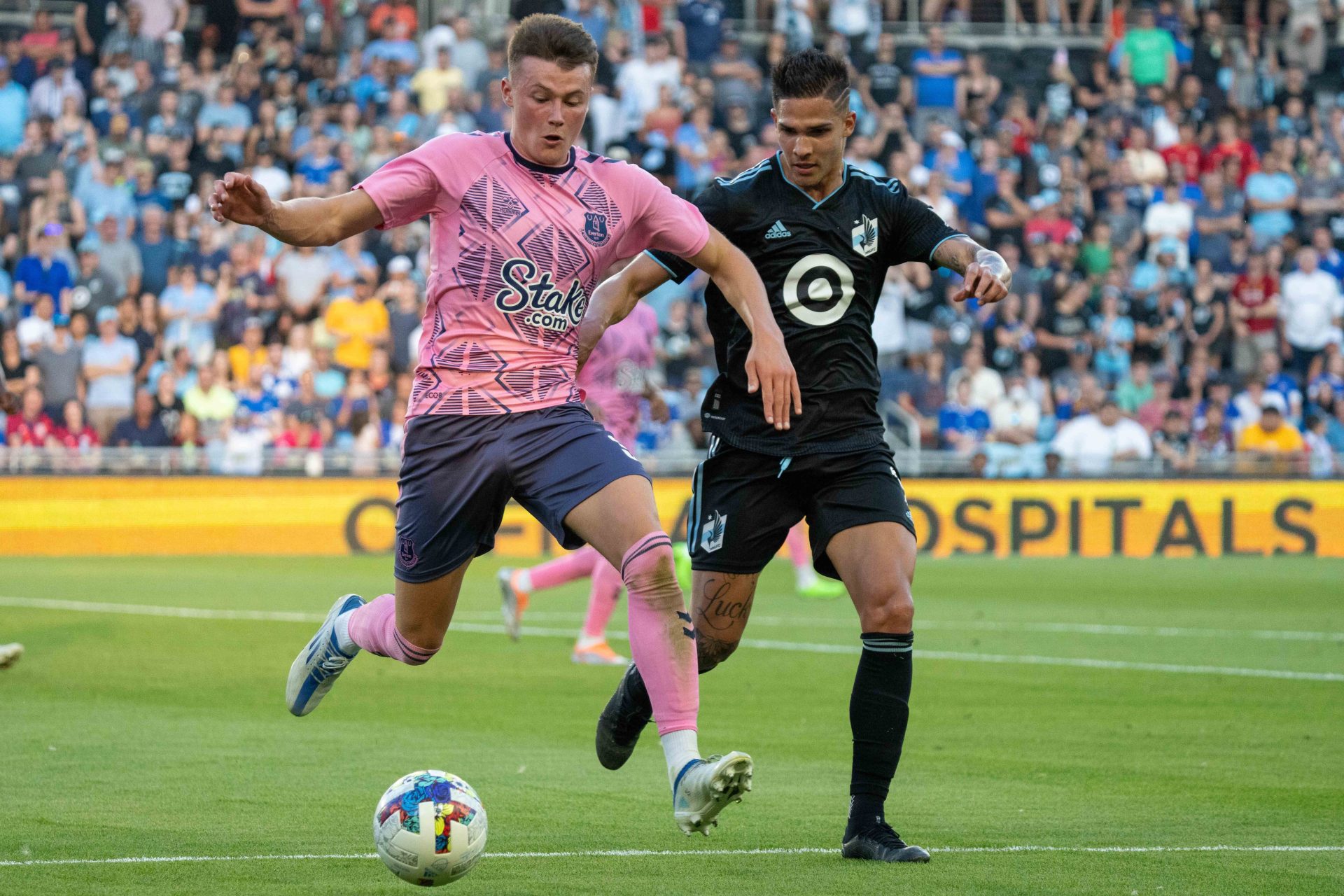 Jul 20, 2022; Minneapolis, MN, USA; Everton defender Nathan Patterson (3) challenged by Minnesota United forward Luis Amarilla (9) in the first half at Allianz Field.