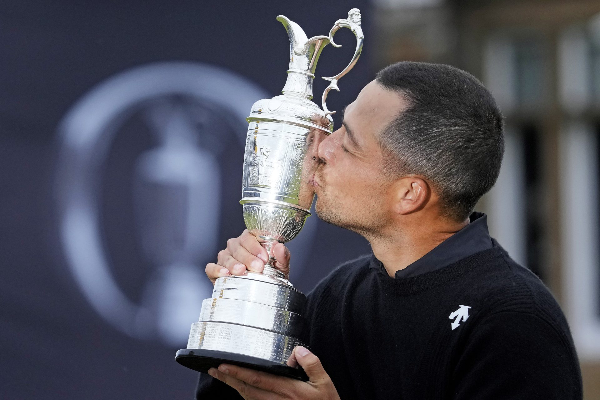 Jul 21, 2024; Ayrshire, SCT; Xander Schauffele celebrates with Claret Jug after winning the Open Championship golf tournament at Royal Troon.
