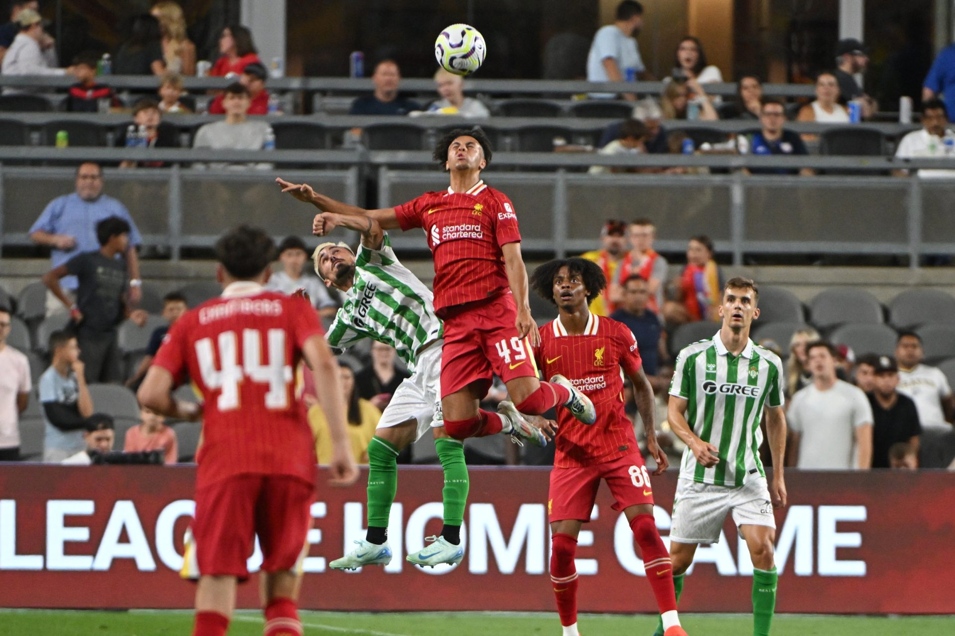 Jul 26, 2024; Pittsburgh, PA, USA; Liverpool forward Kaide Gordon (49) battles Real Betis midfielder Rodri (17) for a header during the second half at Acrisure Stadium.