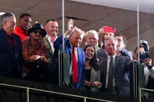 Sep 28, 2024; Tuscaloosa, Alabama, USA; GOP Presidential candidate Donald Trump waves flanked by former Georgia Bulldogs player Herschel Walker, recording art Kid Rock, professional golfer John Daily, Alabama senators Tommy Tuberville (R) and Katie Britt (R) during the second half of the game between the Alabama Crimson Tide and the Georgia Bulldogs at Bryant-Denny Stadium.