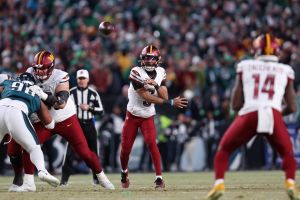 Jan 26, 2025; Philadelphia, PA, USA; Washington Commanders quarterback Jayden Daniels (5) passes the ball against the Philadelphia Eagles during the second half in the NFC Championship game at Lincoln Financial Field.