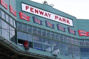 Workers prepare for the Red Sox home-opener at Fenway Park on Wednesday, April 2, 2025.
