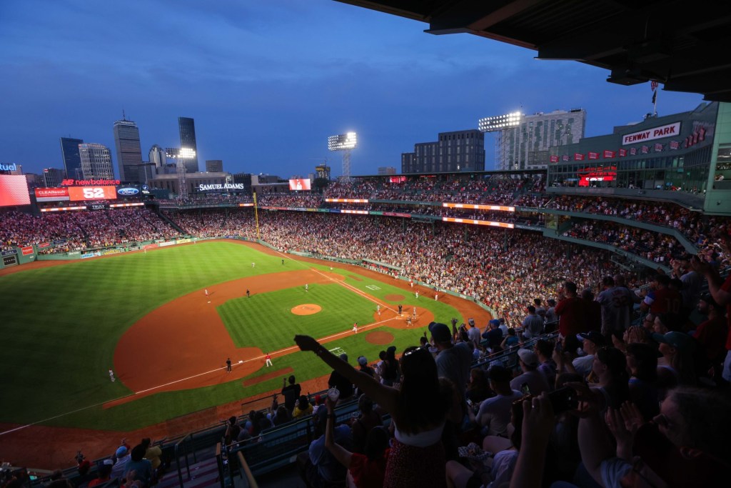 Jul 2, 2025; Boston, Massachusetts, USA; Boston Red Sox fans cheer after a home run by Boston Red Sox designated hitter Wilyer Abreu (52) during the sixth inning against the Cincinnati Reds at Fenway Park.