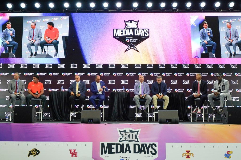 Jul 9, 2025; Frisco, TX, USA; Head coaches Willie Fritz of Houston, Mike Gundy of Oklahoma State, Rich Rodriguez of West Virginia, Lance Leipold of Kansas, Sonny Dykes of TCU, Kyle Whittingham of Utah, Brent Brennan of Arizona and Deion Sanders of Colorado all sit on stage for a Coaches Roundtable during 2025 Big 12 Football Media Days at The Star.