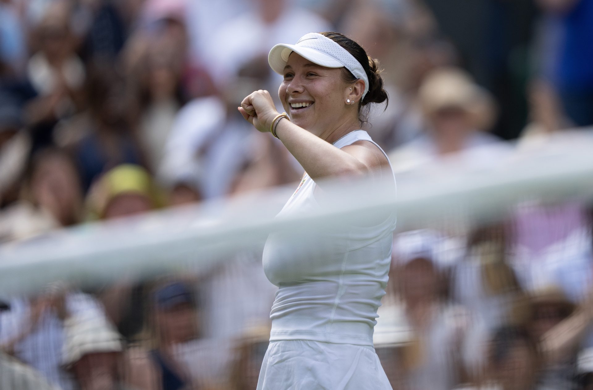Jul 10, 2025; Wimbledon, United Kingdom; Amanda Anisimova of the United States celebrates winning her match against Aryna Sabalenka on day 11 at All England Lawn Tennis and Croquet Club.