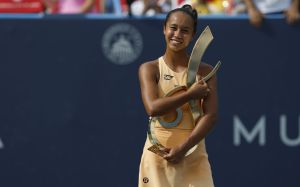 Jul 27, 2025; Washington, D.C., USA; Leylah Fernandez (CAN) celebrates with the championship trophy after her match against Anna Kalinskaya (not pictured) in the women's singles final of the Mubadala Citi DC Open at Rock Creek Park Tennis Center.