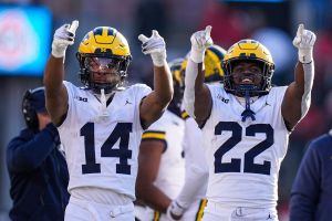 Michigan players wave at fans during the second half against Ohio State at Ohio Stadium in Columbus, Ohio on Saturday, Nov. 30, 2024.