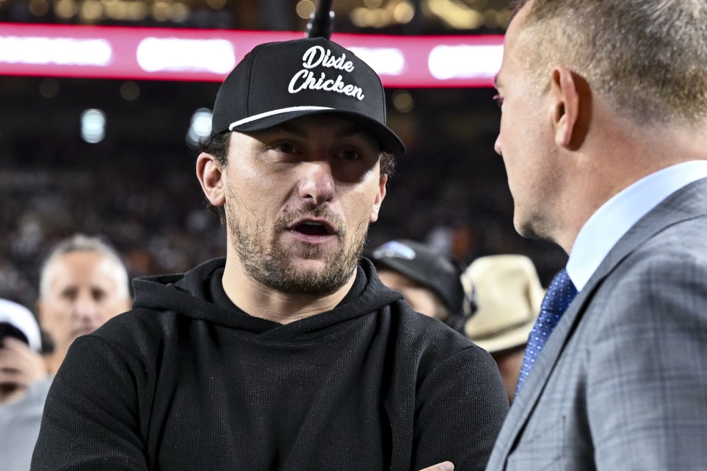Nov 30, 2024; College Station, Texas, USA; Former Texas A&M and Cleveland Browns quarterback Johnny Manziel speaks with ESPN's College GameDay analyst Kirk Herbstreit prior to the game against the Texas Longhorns. The Longhorns defeated the Aggies 17-7 at Kyle Field.