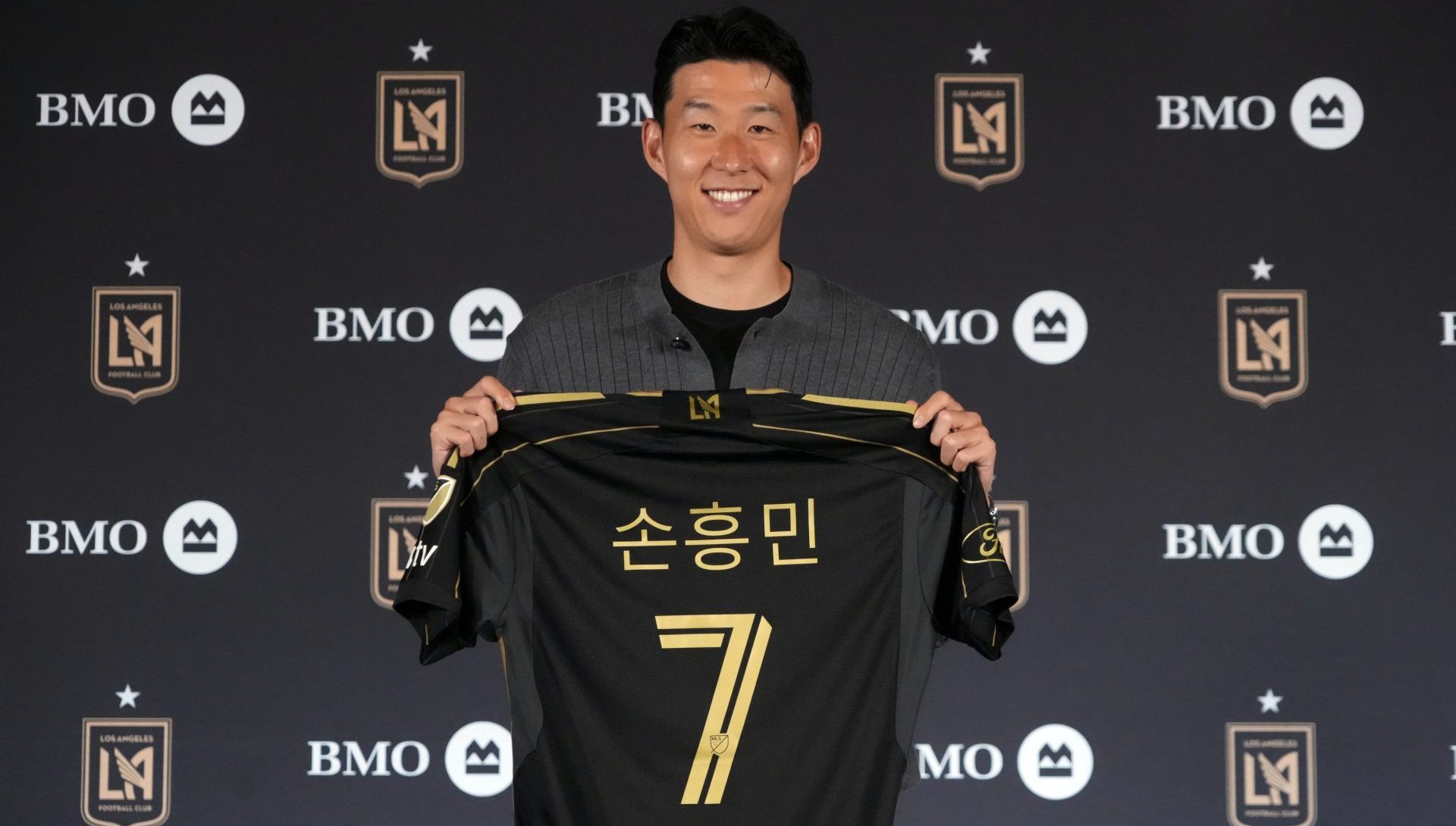 Aug 6, 2025; Los Angeles, California, USA; Son Heung-min poses during an LAFC introductory press conference at BMO Stadium