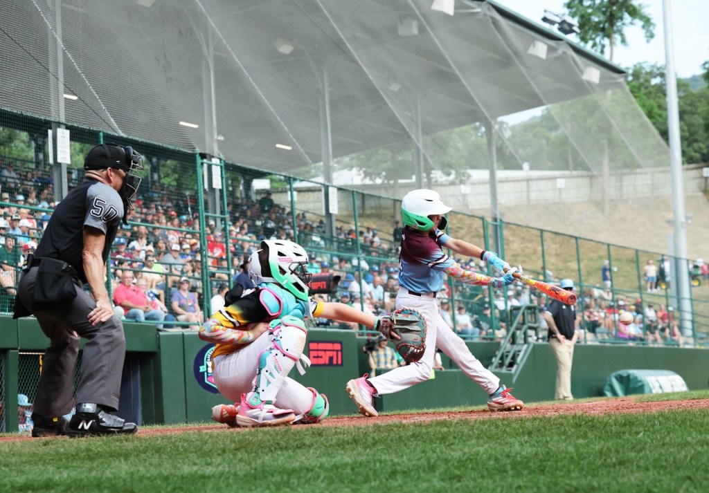 Braintree American batter Ryan Fennell hits the ball against Southeast pitcher Brody Miller during the Little League Baseball World Series at South Williamsport, PA on Thursday, Aug. 13, 2025.