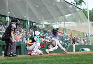 Braintree American batter Ryan Fennell hits the ball against Southeast pitcher Brody Miller during the Little League Baseball World Series at South Williamsport, PA on Thursday, Aug. 13, 2025.