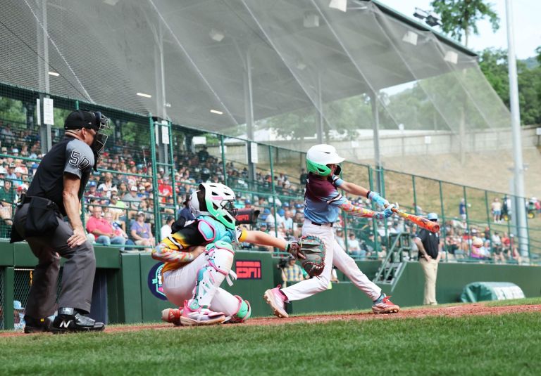 Braintree American batter Ryan Fennell hits the ball against Southeast pitcher Brody Miller during the Little League Baseball World Series at South Williamsport, PA on Thursday, Aug. 13, 2025.