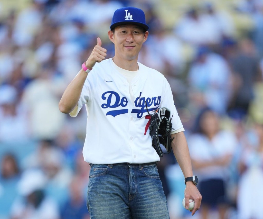 Aug 27, 2025; Los Angeles, California, USA; Los Angeles FC soccer forward Son Heung-min (7) waves to fans at Dodger Stadium