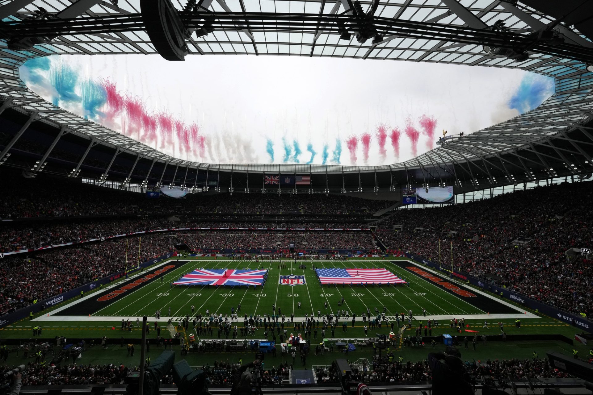 Oct 13, 2024; London, United Kingdom; A general overall view of United States and British flags on the field during the playing of the national anthem before an NFL International Series game between the Chicago Bears and the Jacksonville Jaguars at Tottenham Hotspur Stadium.