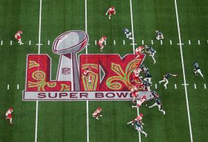 Feb 9, 2025; New Orleans, LA, USA; Philadelphia Eagles quarterback Jalen Hurts (1) fakes a hand off in the first quarter against the Kansas City Chiefs during Super Bowl LIX at Caesars Superdome.