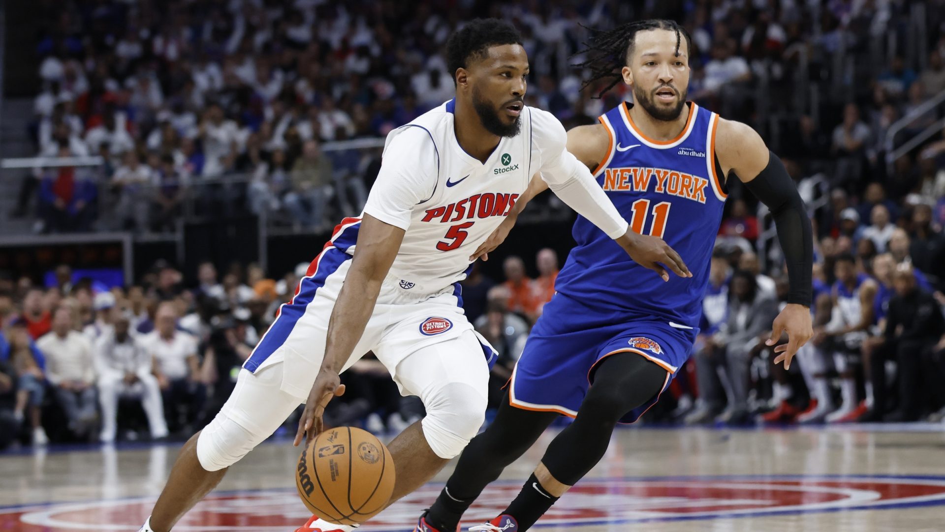 Apr 24, 2025; Detroit, Michigan, USA; Detroit Pistons guard Malik Beasley (5) dribbles on New York Knicks guard Jalen Brunson (11) in the second half during game three of first round for the 2024 NBA Playoffs at Little Caesars Arena.