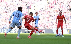 April 27, 2025; Anfield, Liverpool, BRITAIN; Liverpool player Mohamed Salah scores the fourth goal against the Tottenham Hotspur in a Premier League match.