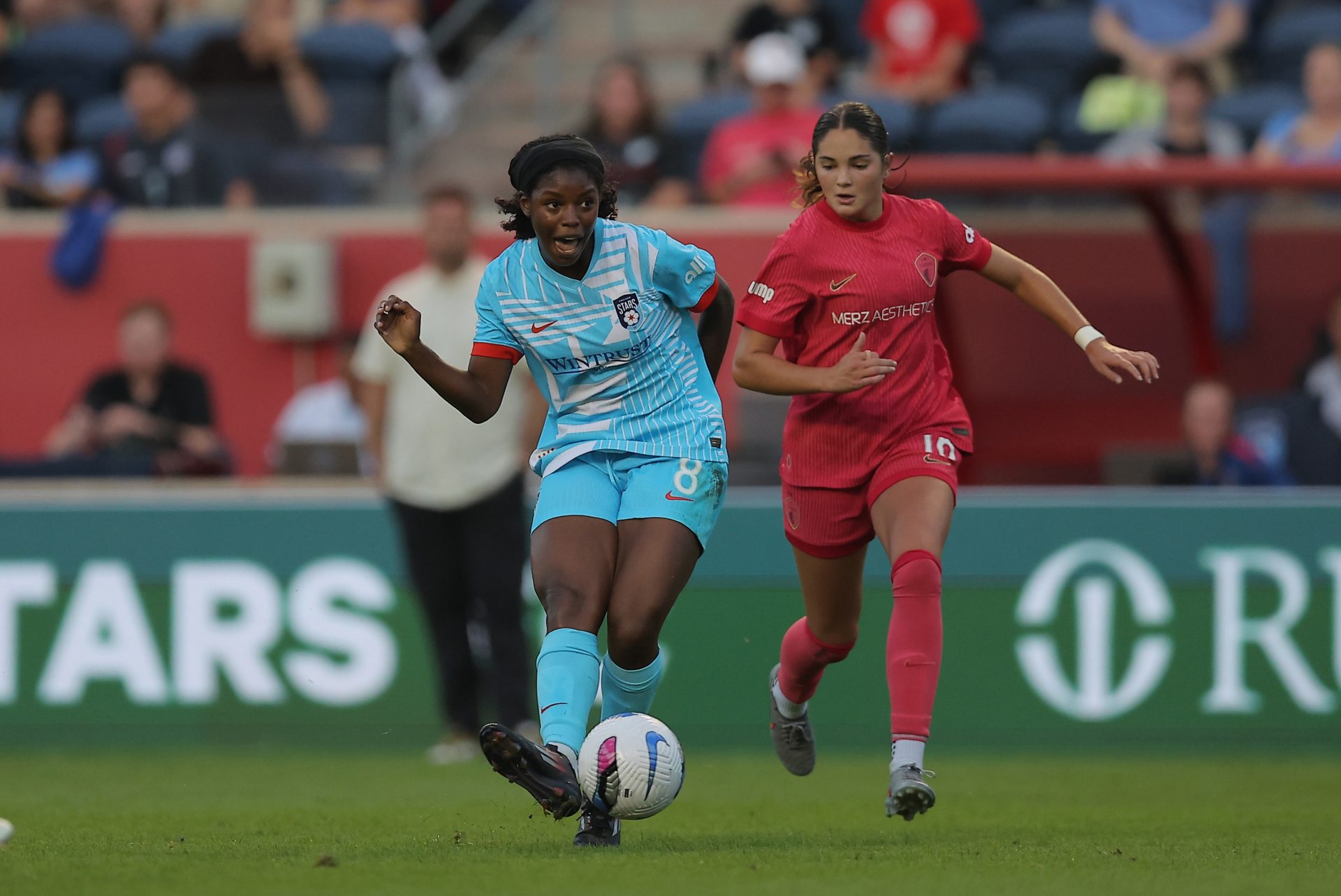 Aug 22, 2025; Bridgeview, Illinois, USA; Chicago Stars FC forward Jameese Joseph (8) passes the ball during the first half of a match against the North Carolina Courage at SeatGeek Stadium.