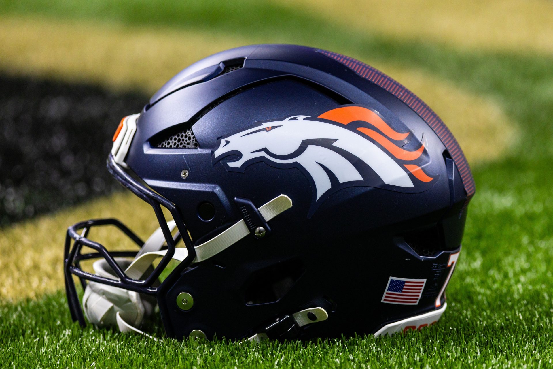 Aug 23, 2025; New Orleans, Louisiana, USA; Detailed view of the Denver Broncos helmet against the New Orleans Saints during warmups at Caesars Superdome.
