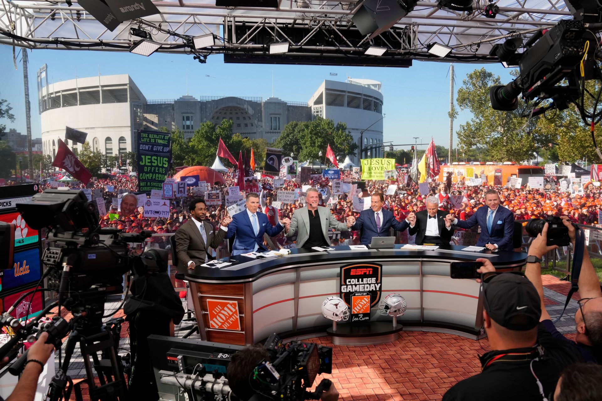 The cast of ESPN College GameDay begins their show prior to the NCAA football game between the Ohio State Buckeyes and the Texas Longhorns at Ohio Stadium on Aug. 30, 2025. The show is the final one for Lee Corso.