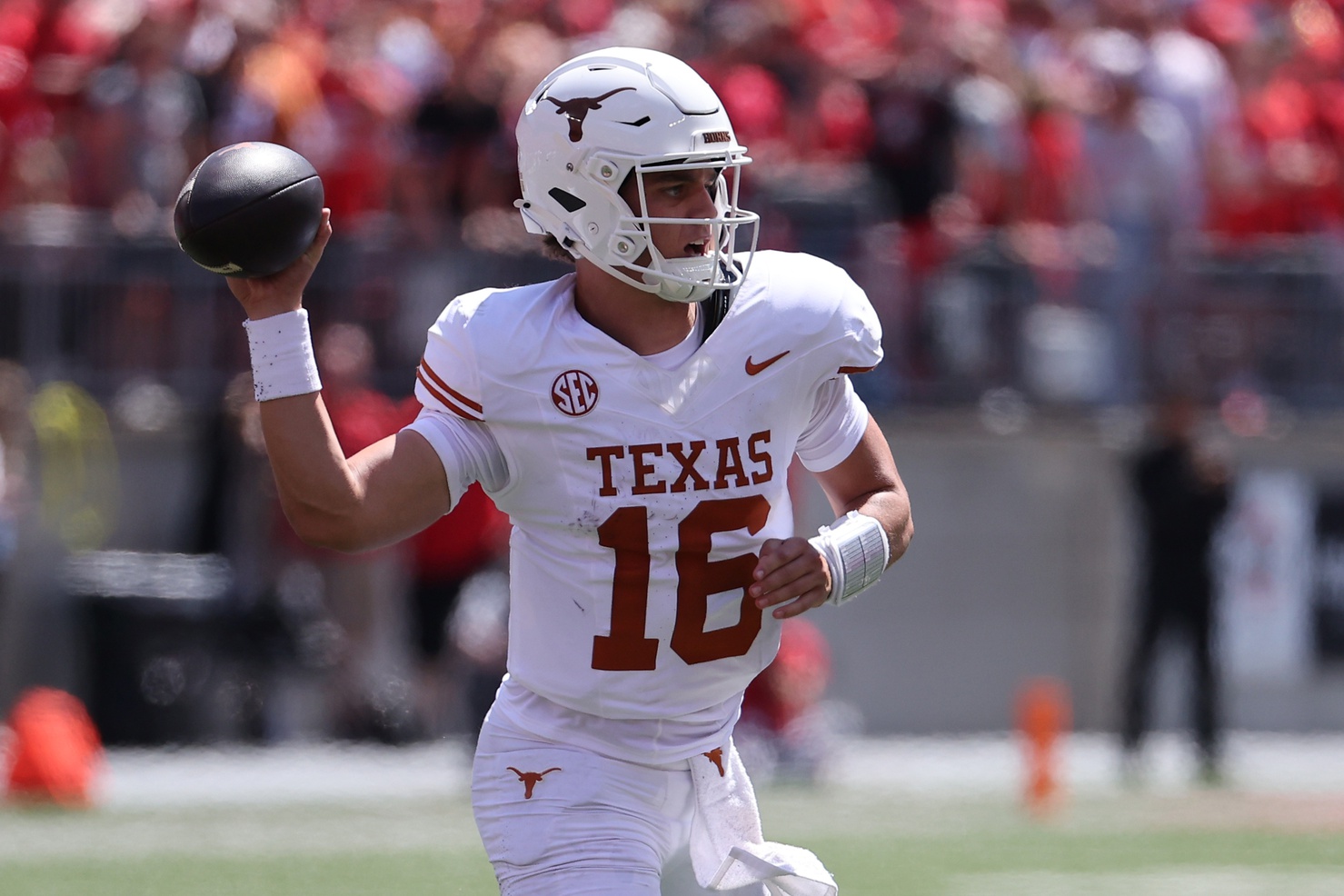 Aug 30, 2025; Columbus, Ohio, USA; Texas Longhorns quarterback Arch Manning (16) drops back to pass against the Ohio State Buckeyes in the first half at Ohio Stadium.