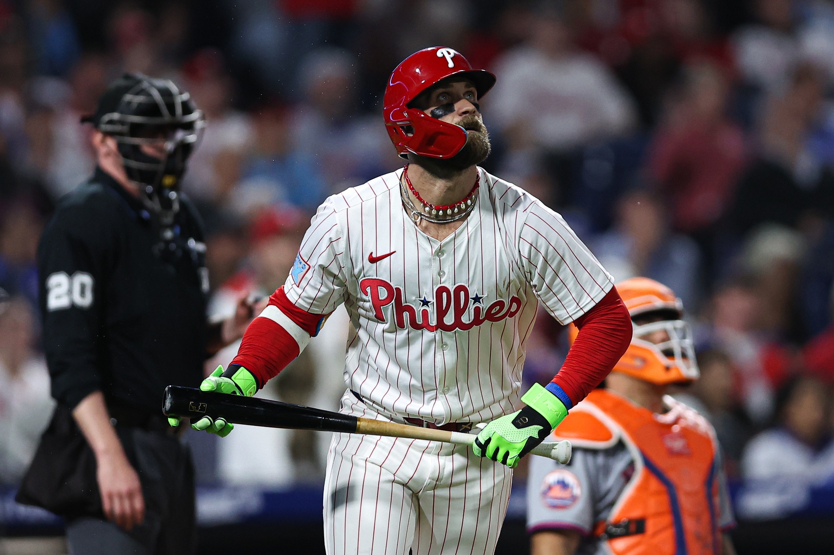 Sep 10, 2025; Philadelphia, Pennsylvania, USA; Philadelphia Phillies first base Bryce Harper (3) watches his ball clear the wall for a home run against the New York Mets during the seventh inning at Citizens Bank Park