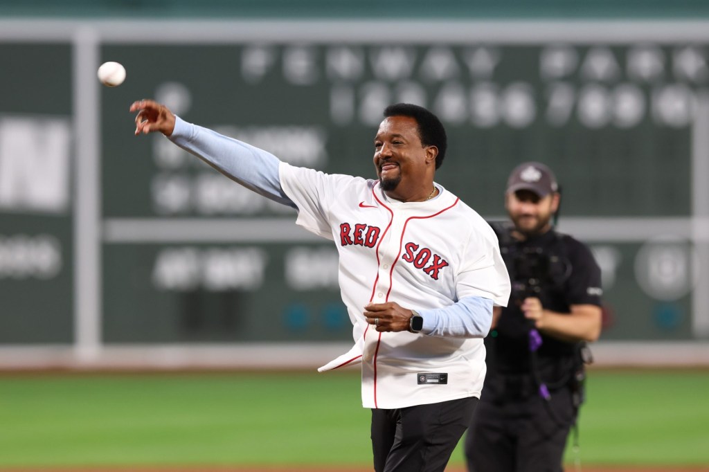 Sep 12, 2025; Boston, Massachusetts, USA; Former Boston Red Sox Pedro Martinez throws out the first pitch before a game against the New York Yankees at Fenway Park.