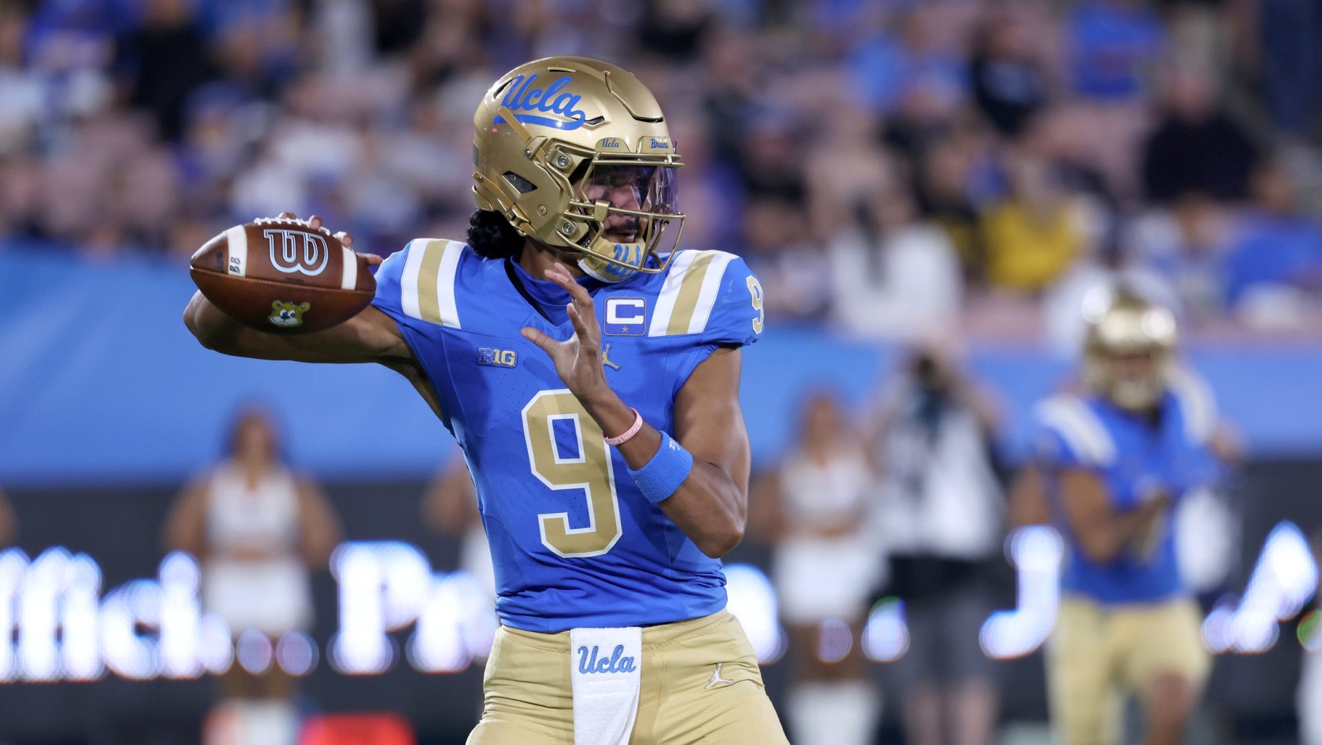 Sep 12, 2025; Pasadena, California, USA; UCLA Bruins quarterback Nico Iamaleava (9) looks to pass during the first quarter against the New Mexico Lobos at Rose Bowl.