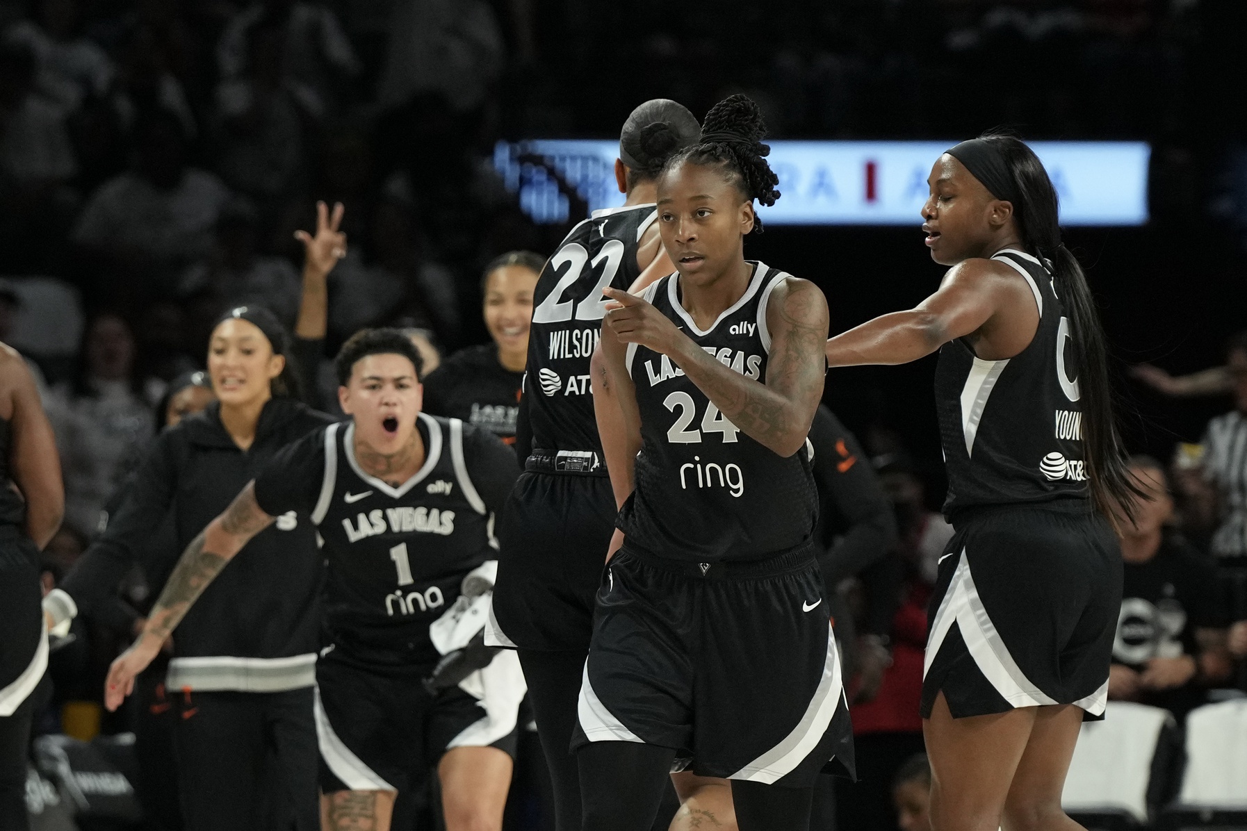 Sep 14, 2025; Las Vegas, Nevada, USA; Las Vegas Aces guard Jewell Loyd (24) gestures to a teammate after scoring against the Seattle Storm in the first quarter during game one of round one for the 2025 WNBA Playoffs at Michelob Ultra Arena.