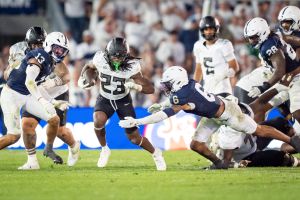 Oregon running back Dierre Hill Jr. picks up yards for the Ducks as the Oregon Ducks face the Penn State Nittany Lions on Sept. 27, 2025, at Beaver Stadium in University Park, Pennsylvania.