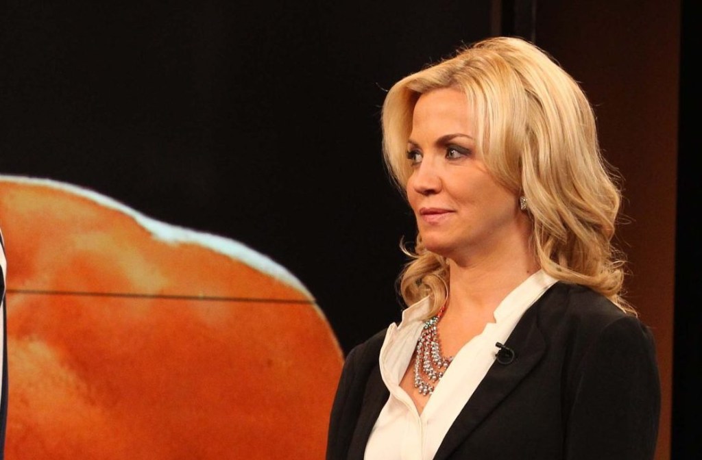 Apr 19, 2013; New York, NY, USA; Tyson Fury stands alongside Michelle Beadle on the set of the NBC Sports television show The Crossover.