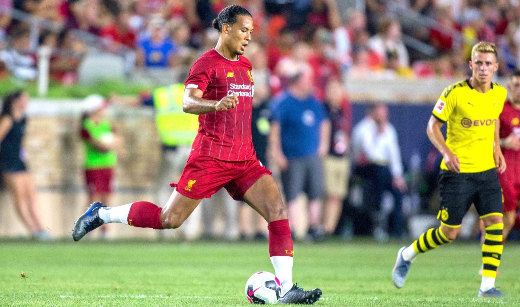 Jul 19, 2019; South Bend, IN, USA; Liverpool defender Virgil van Dijk (4) passes the ball in the second half of a preseason preparation soccer match against the Borussia Dortmund at Notre Dame.