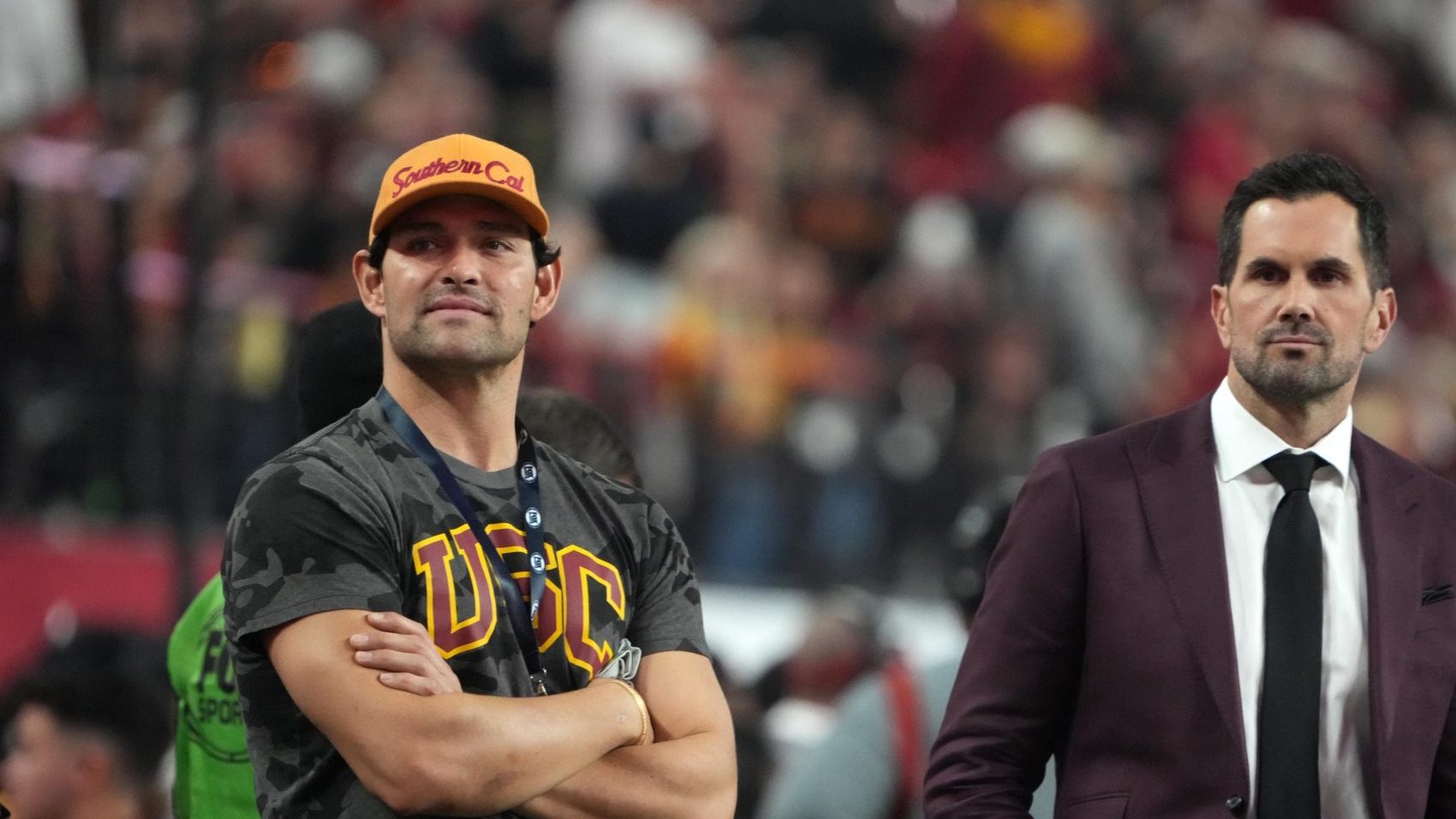 Dec 2, 2022; Las Vegas, NV, USA; Southern California Trojans former quarterbacks Mark Sanchez (left) and Matt Leinart watch from the sidelines during the Pac-12 Championship game against the Utah Utes at Allegiant Stadium.