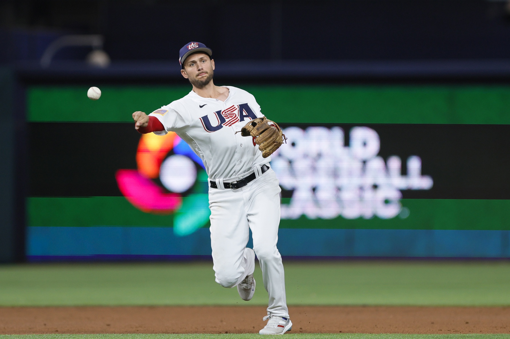 Mar 19, 2023; Miami, Florida, USA; USA shortstop Trea Turner (8) throws to first base for an out during the first inning at LoanDepot Park.
