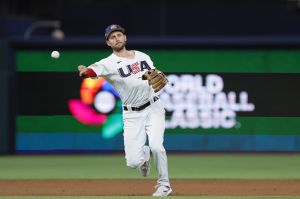 Mar 19, 2023; Miami, Florida, USA; USA shortstop Trea Turner (8) throws to first base for an out during the first inning at LoanDepot Park.