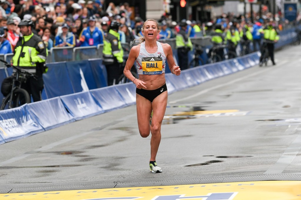 Apr 17, 2023; Boston, MA, USA; Sara Hall (USA) crosses the finish line at the 2023 Boston Marathon