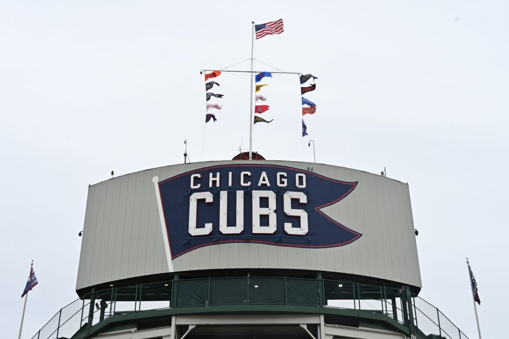 Apr 9, 2025; Chicago, Illinois, USA; The Chicago Cubs flag sign is seen prior to a game between the Texas Rangers and Chicago Cubs at Wrigley Field
