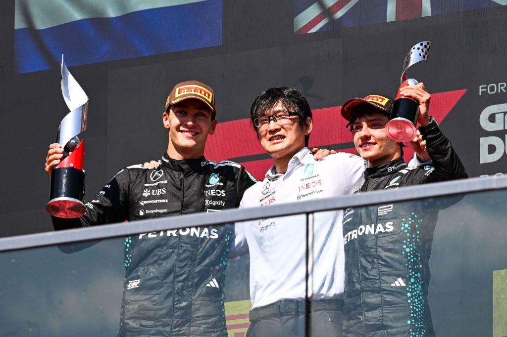 Jun 15, 2025; Montreal, Quebec, Canada; Mercedes driver George Russell (63) and Mercedes driver Kimi Antonelli (12) celebrate their first and third place at the F1 Canadian Grand Prix at Circuit Gilles-Villeneuve.
