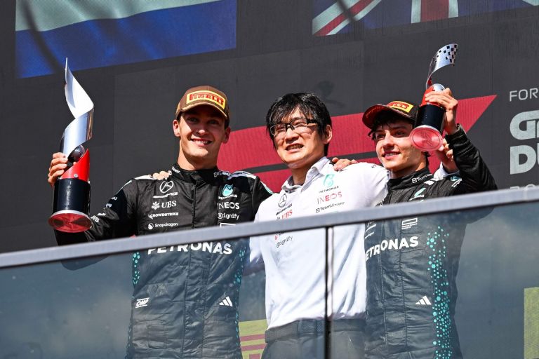 Jun 15, 2025; Montreal, Quebec, Canada; Mercedes driver George Russell (63) and Mercedes driver Kimi Antonelli (12) celebrate their first and third place at the F1 Canadian Grand Prix at Circuit Gilles-Villeneuve.