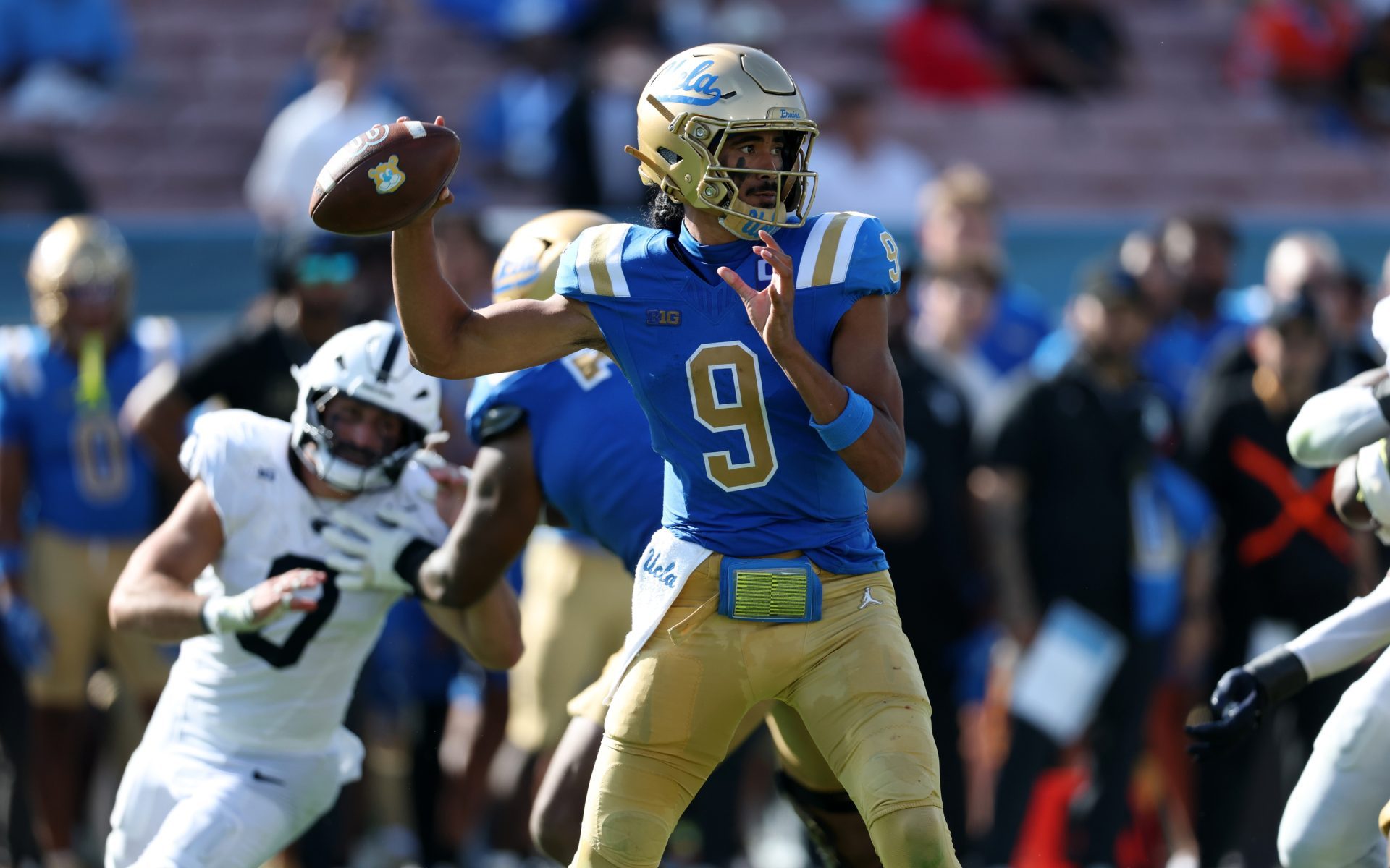 Oct 4, 2025; Pasadena, California, USA; UCLA Bruins quarterback Nico Iamaleava (9) drops back to pass during the fourth quarter against the Penn State Nittany Lions at Rose Bowl.